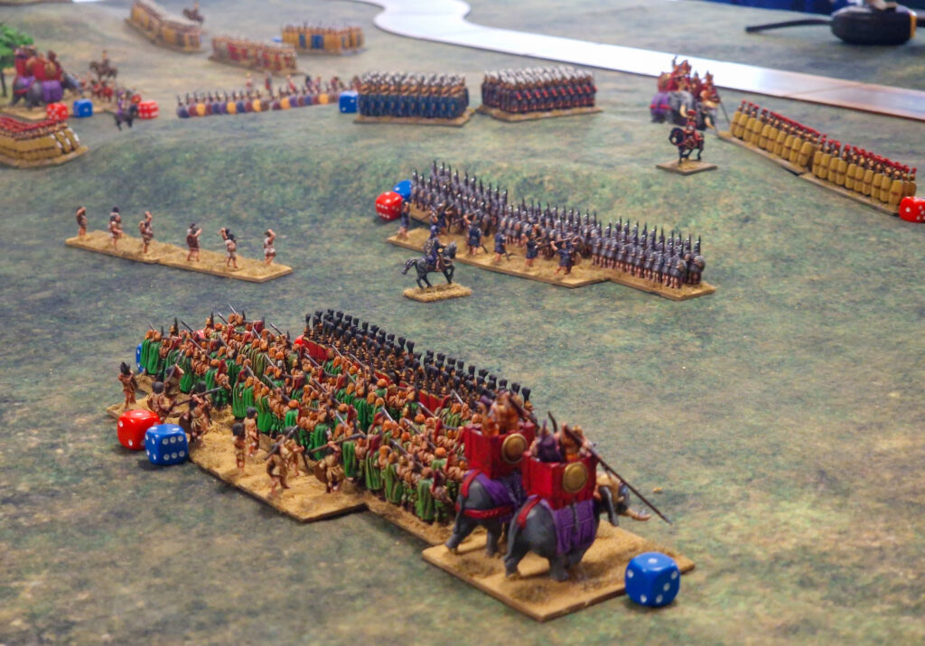 Hail Caesar Epic Battles Game report; Legionaries singlehandedly push back the Gallic warband, Numidian Skirmishers and a unit of Carthaginian war elephants, leaving Hannibal's line in tatters.