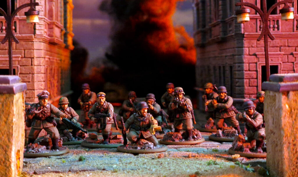 Bolt Action by Warlord Games - Veterans cautious pick through the ruined streets.