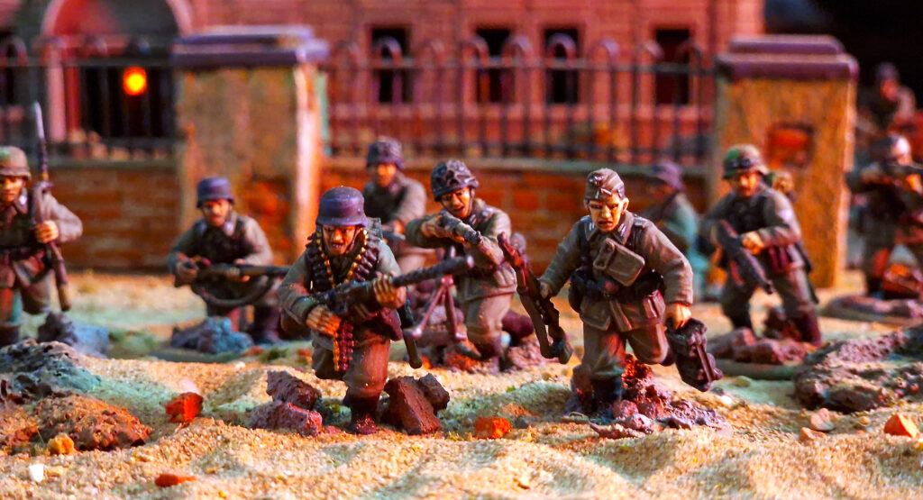 Bolt Action by Warlord Games - German Veterans sprint for cover.