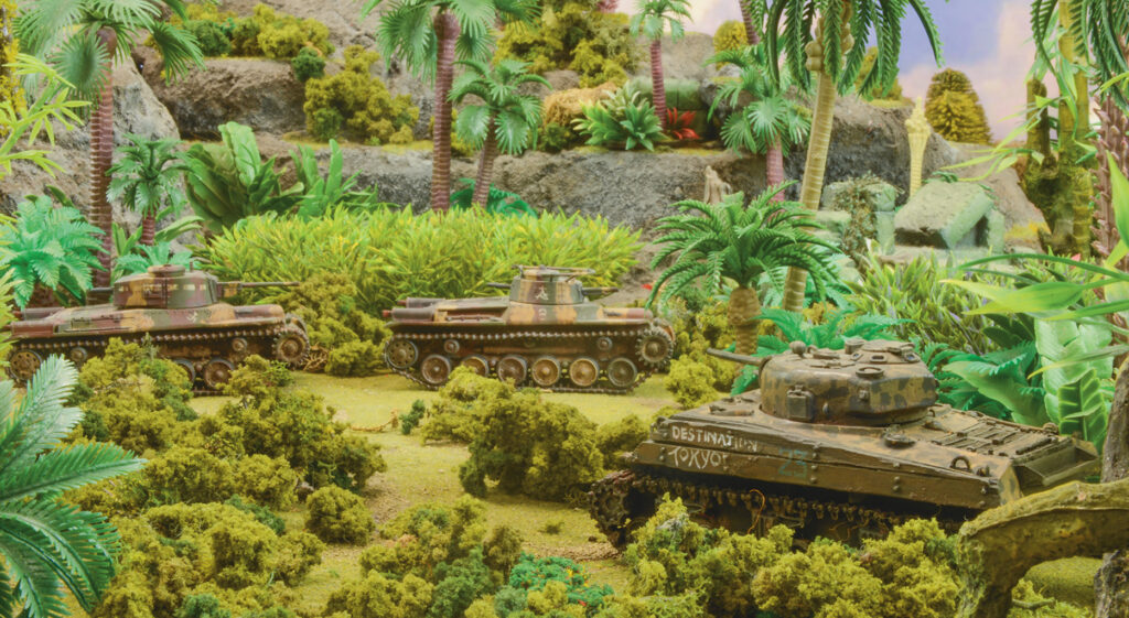 Achtung Panzer! by Warlord Games, Destination Tokyo! A Sherman pounces upon unwitting Japanese armour on a tiny Pacific island