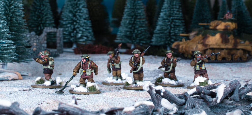 Winter British Engineers by Warlord Games move forward to clear the path for an M3.